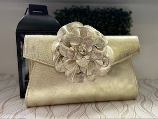 Plus gold clutch bag by: Italy